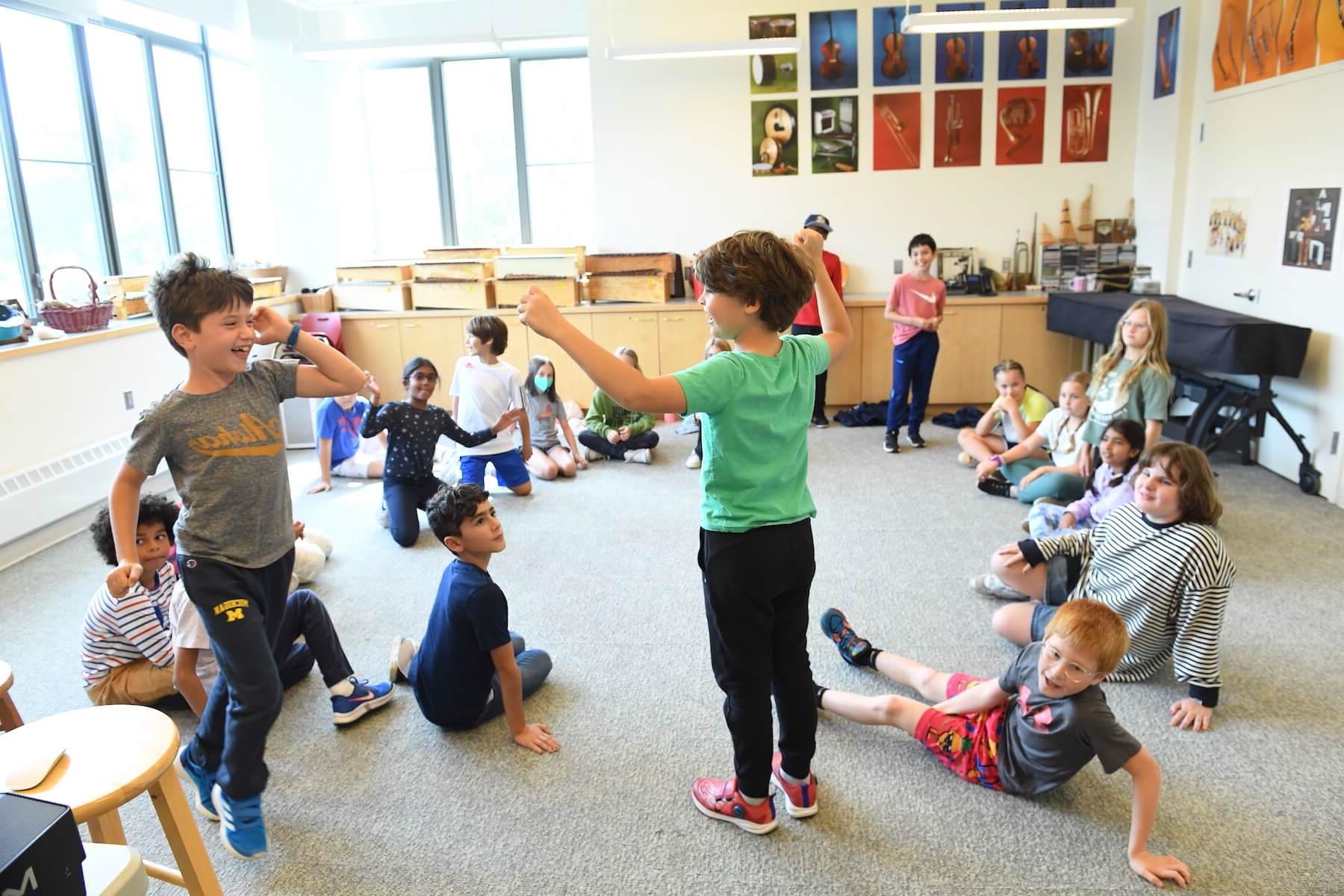 Ethical Culture Fieldston School Fieldston Lower students sitting in circle during music class